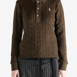 Brown sweater worn by a person, showing the sweater fit