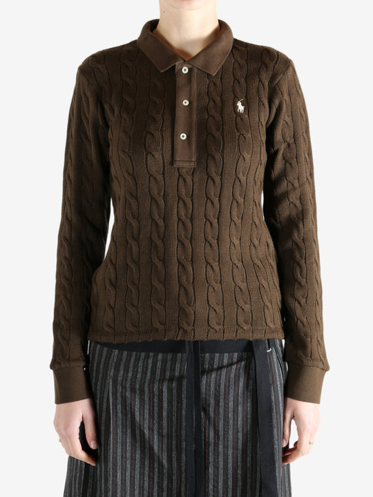 Brown sweater worn by a person, showing the sweater fit