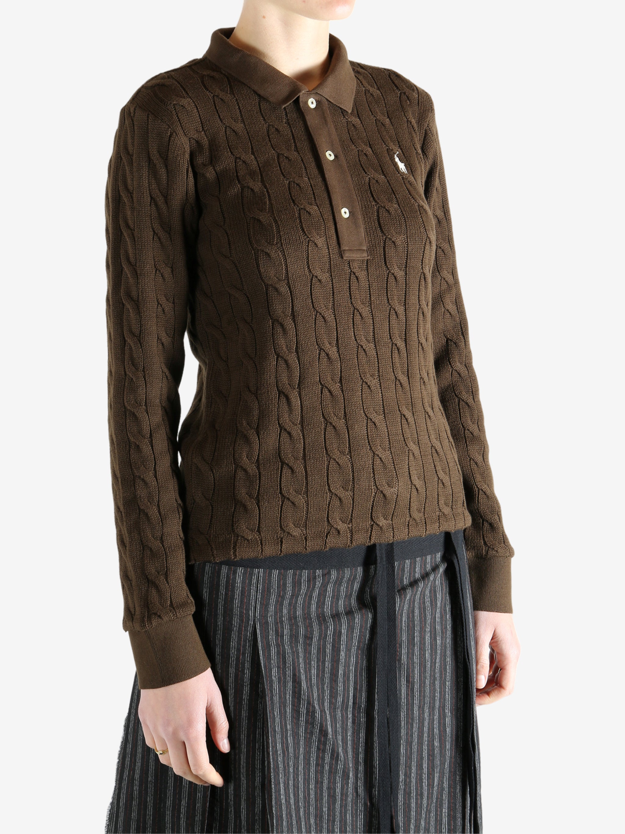Brown sweater worn by a person, showing the sweater fit