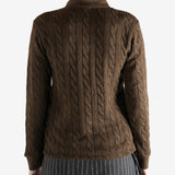Brown sweater worn by a person, showing the sweater fit