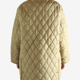 tan sweater worn by a person, showing the sweater fit