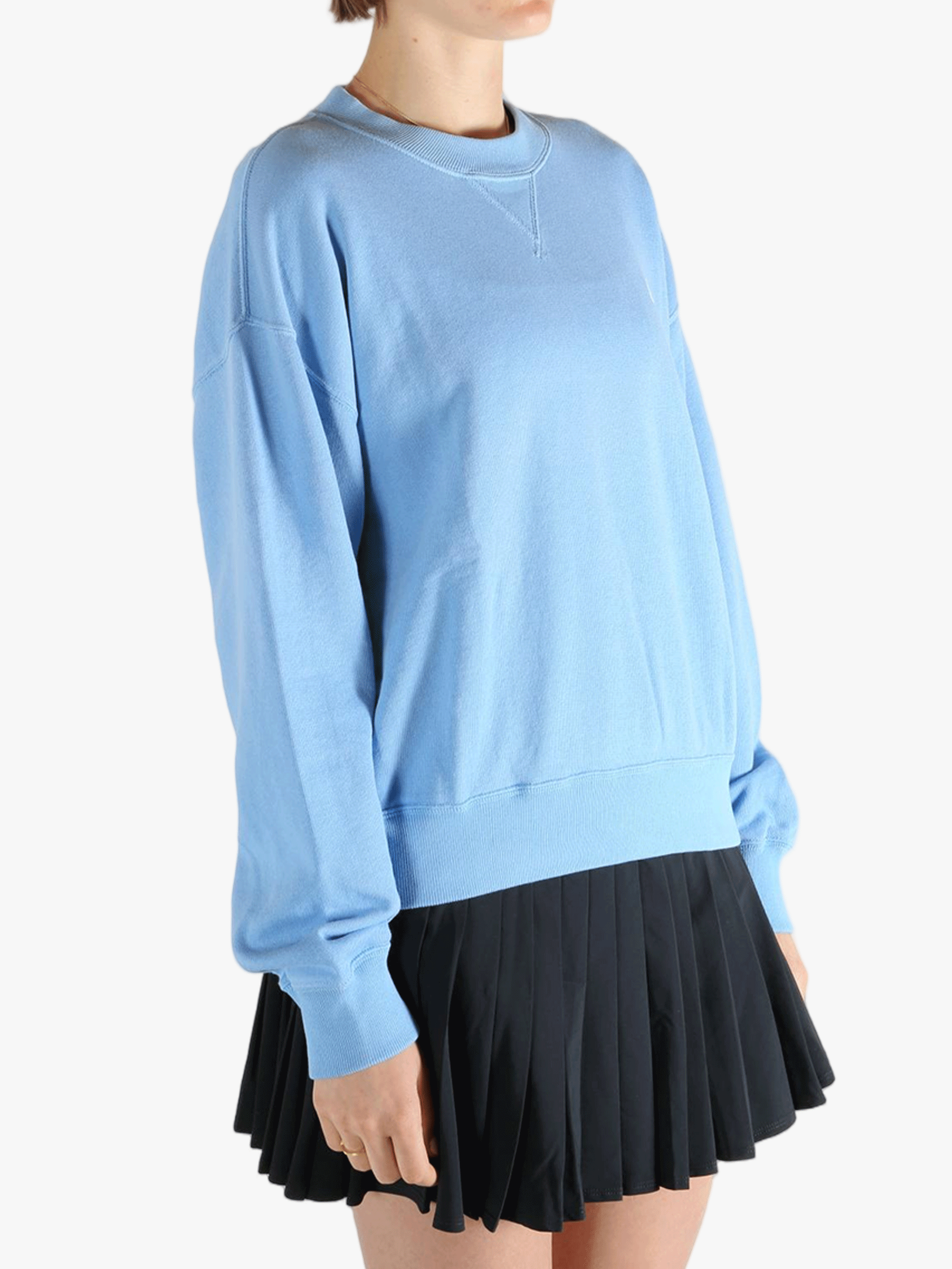 Blue hoodie  worn by a person, showing the hoodie 's fit