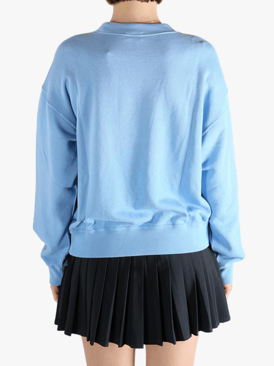 Blue hoodie  worn by a person, showing the hoodie 's fit