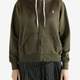 Bronw hoodie worn by a person, showing the hoodie's fit