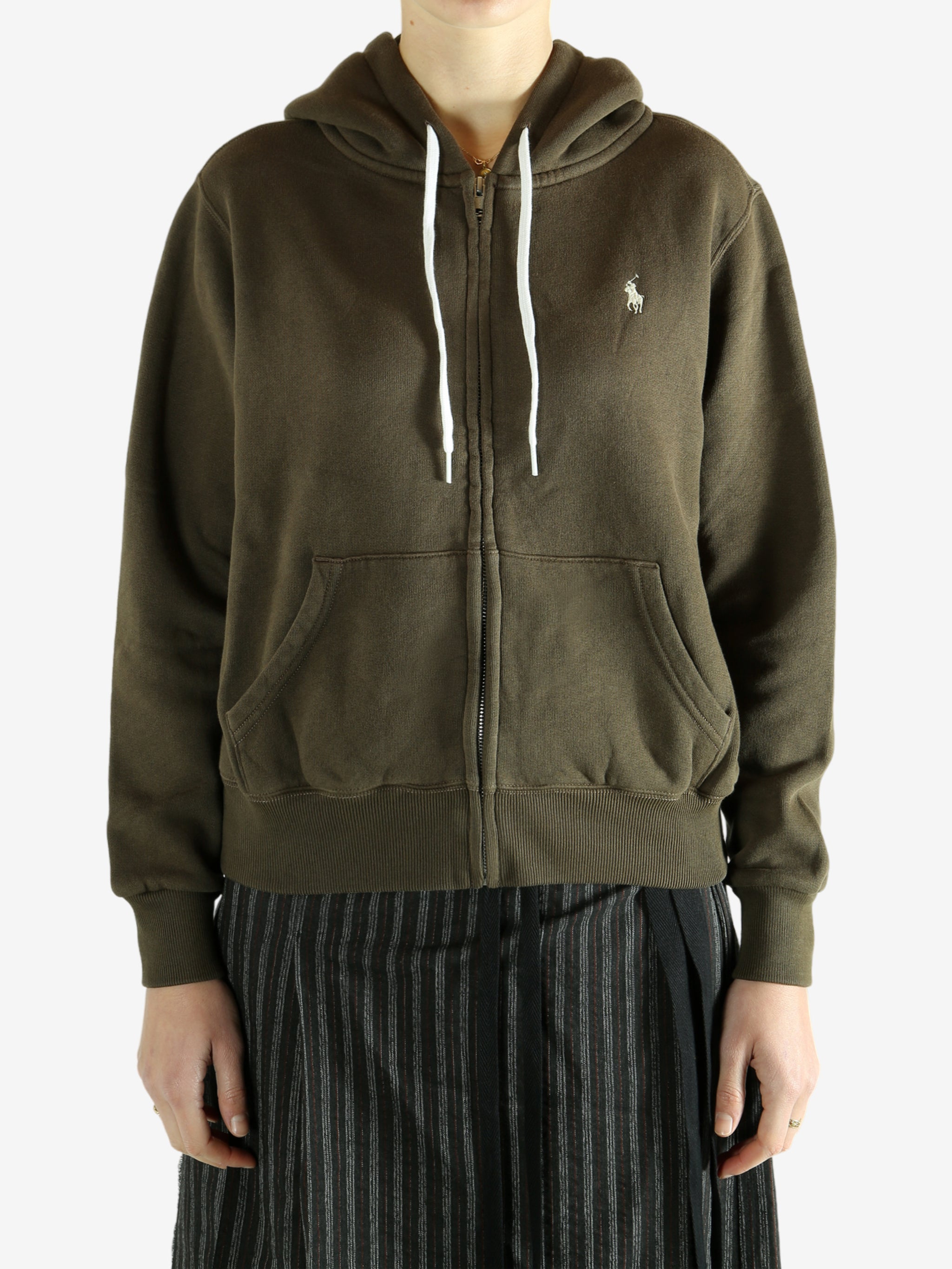 Bronw hoodie worn by a person, showing the hoodie's fit
