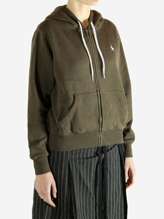 Bronw hoodie worn by a person, showing the hoodie's fit