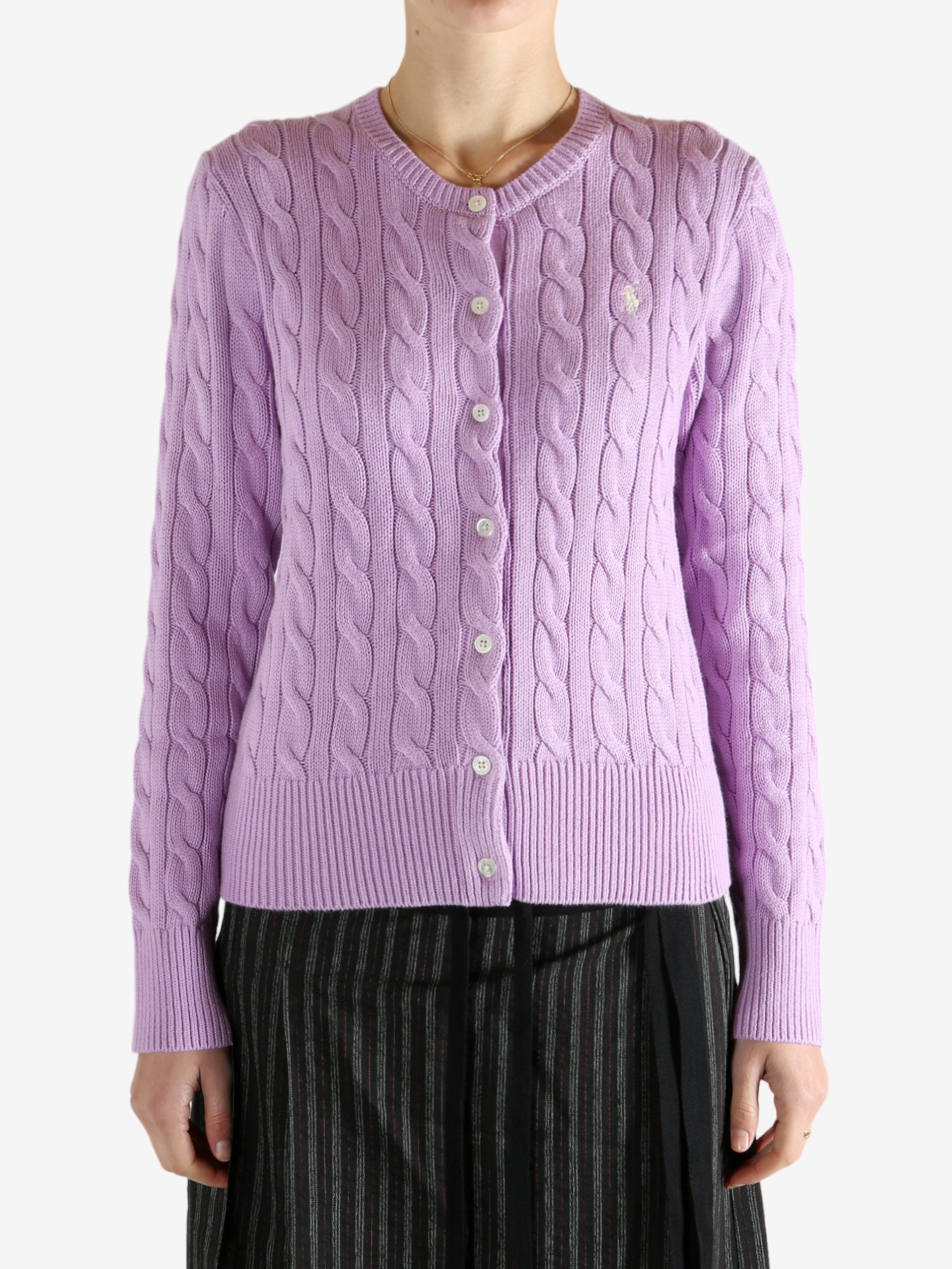 Purple cardigan worn by a person, showing the cardigan's fit
