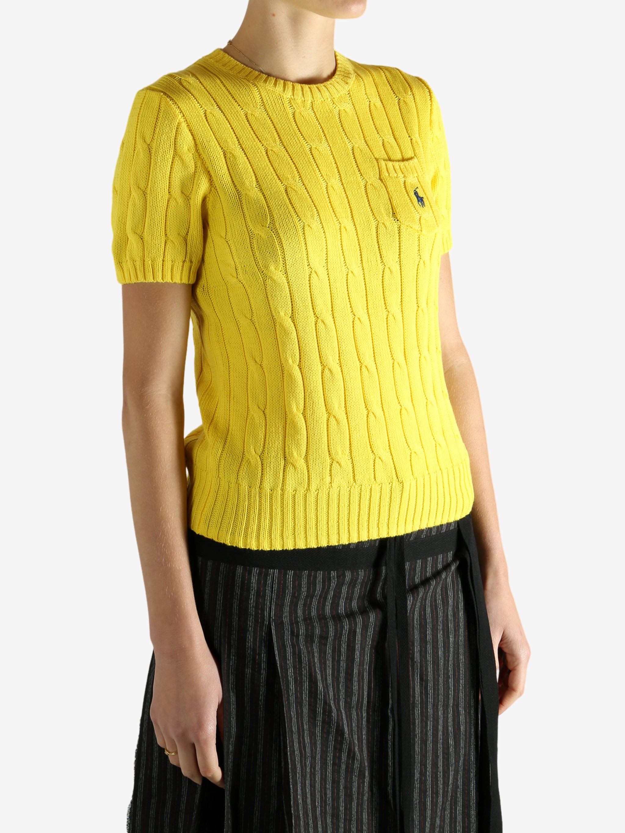 yellow sweater worn by a person, showing the sweater fit