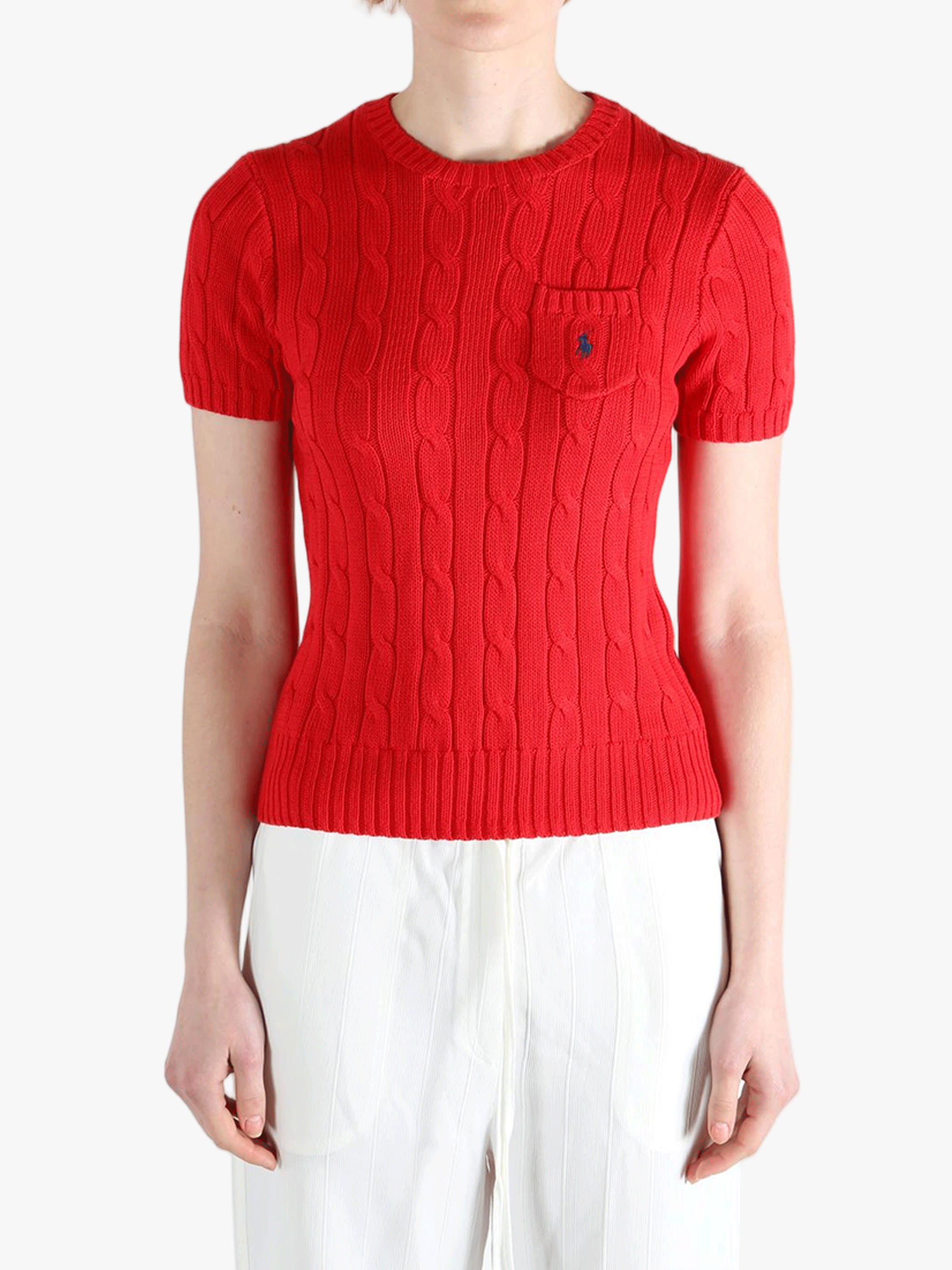 Red knitwear worn by a person, showing knitwear's fit
