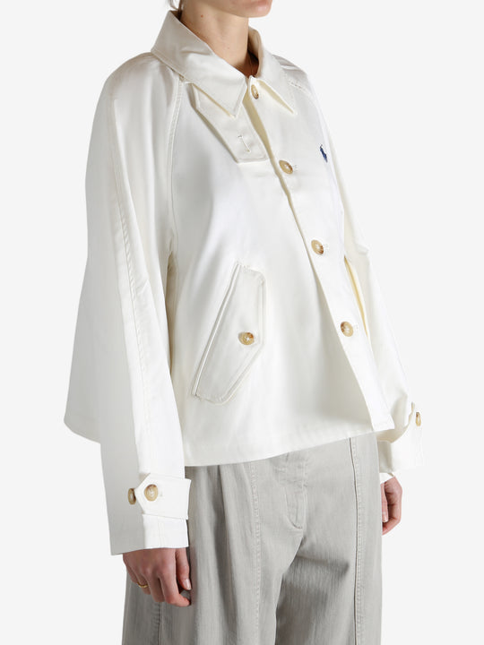 White jacket worn by a person, showing the jacket's fit