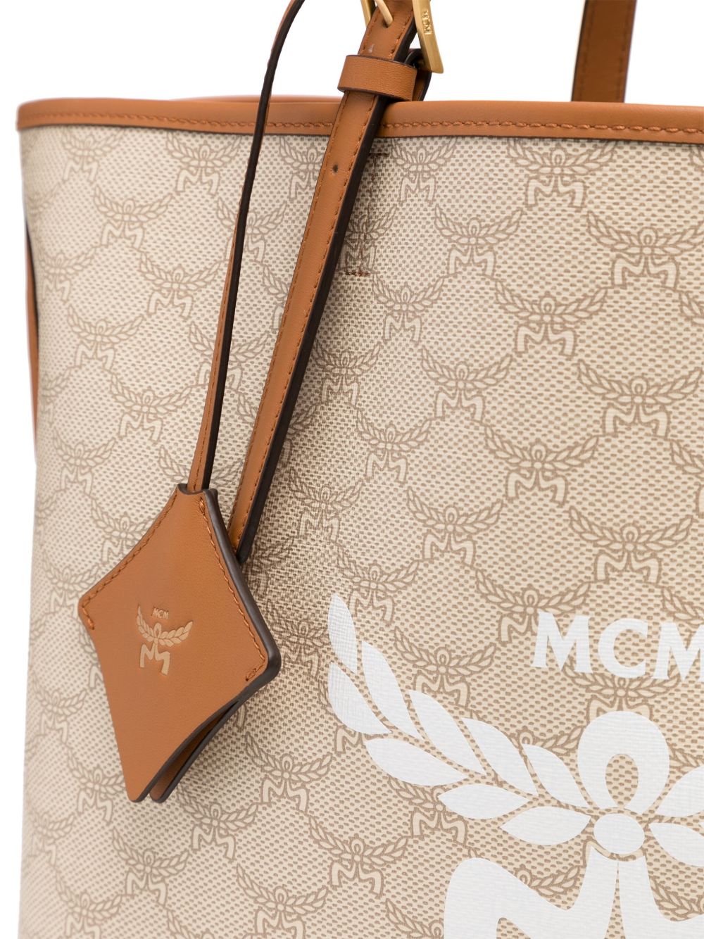 Close up of tan bag, showing texture of canvas fabric