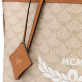 Close up of tan bag, showing texture of canvas fabric