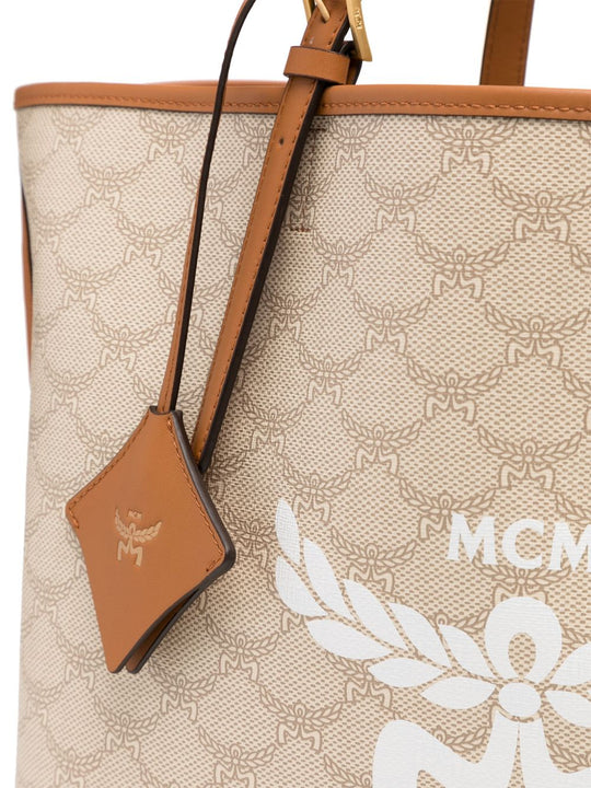 Close up of tan bag, showing texture of canvas fabric