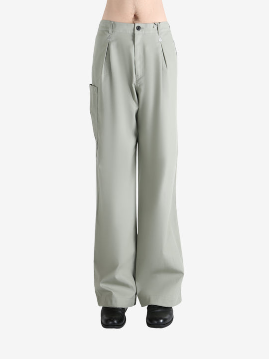 Grey pants worn by a person, showing the pants' fit