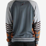 Grey jumper worn by a person, showing the jumper's fit