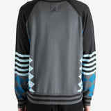 Grey jumper worn by a person, showing the jumper's fit