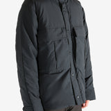 Black jacket worn by a person, showing the jacket's fit