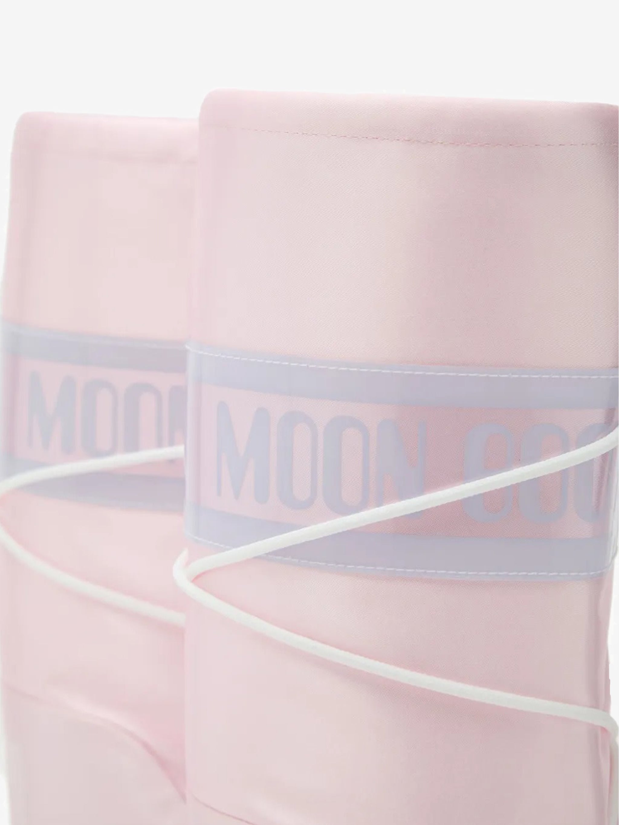 Close up of pink boots, showing texture of the polyester blend fabric