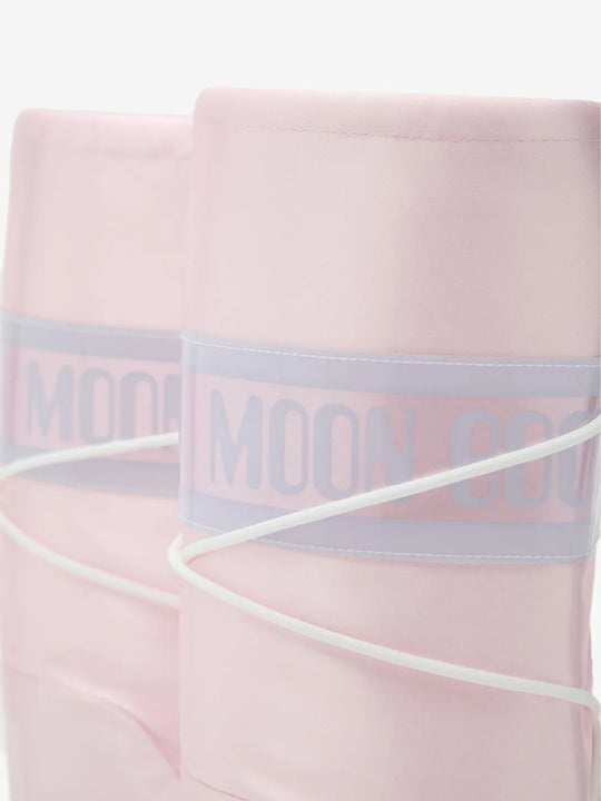 Close up of pink boots, showing texture of the polyester blend fabric