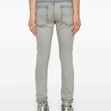 Blue pants worn by a person, showing the pants fit