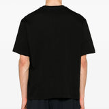 Black t-shirt worn by a person, showing the t-shirt fit