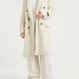 White knitwears, full body view