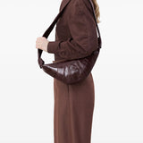 Brown croissant bag, full body view