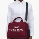 Burgundy bag, full body view