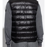 Black top worn by a person, showing the polyamide fit