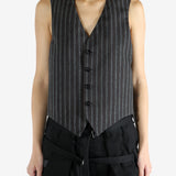 Black jacket worn by a person, showing the jacket's fit