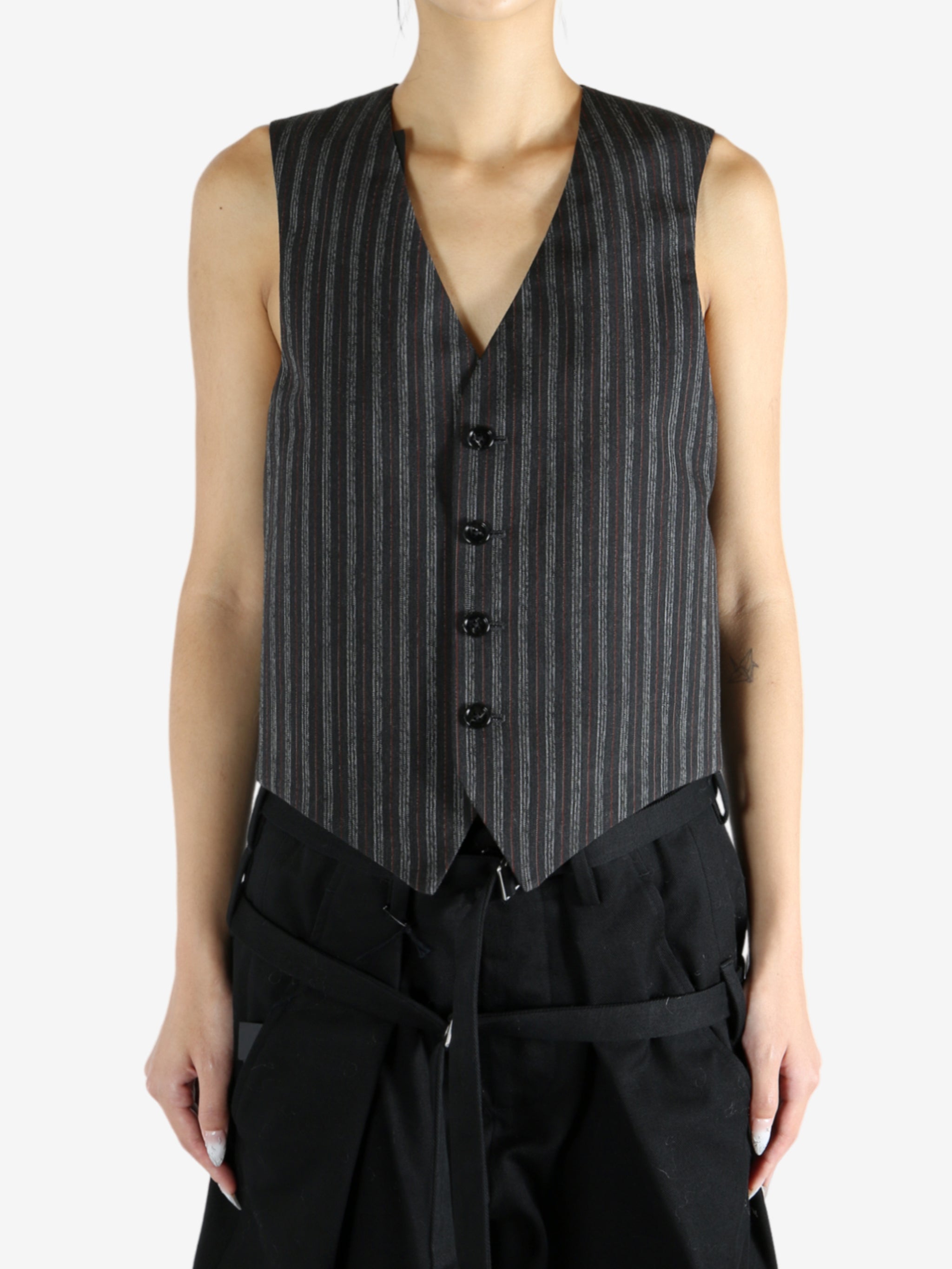 Black jacket worn by a person, showing the jacket's fit