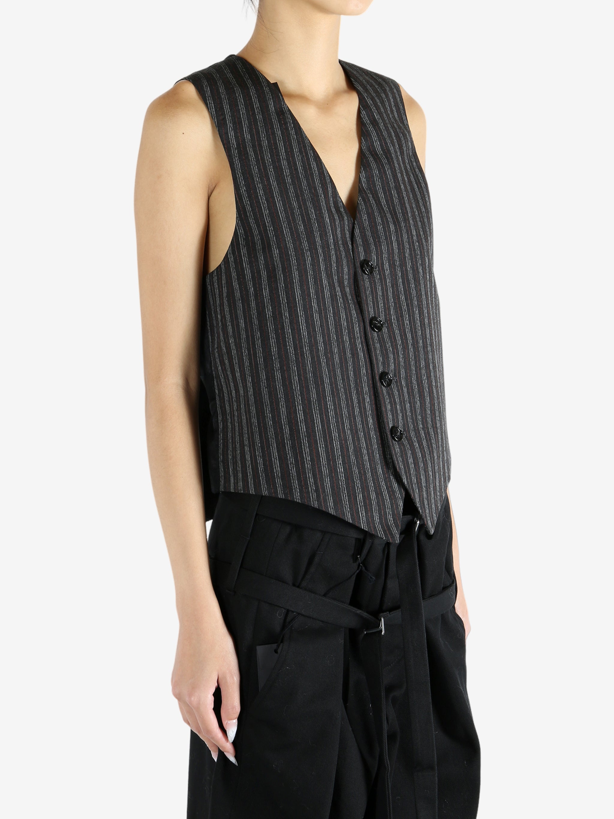 Black jacket worn by a person, showing the jacket's fit