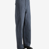 Grey pants worn by a person, showing the pants' fit