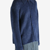 Navy cardigan worn by a person, showing the cardigan's fit