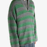 Green shirt worn by a person, showing the shirt fit