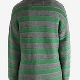 Green shirt worn by a person, showing the shirt fit