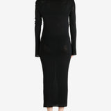 Black dress worn by a person, showing the dress's fit