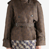 Brown coat worn by a person, showing the coat's fit