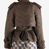 Brown coat worn by a person, showing the coat's fit