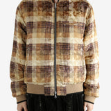 Yellow bomber jacket worn by a person,showing the jacket fit