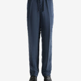 Navy pant worn by a person, showing the pant's fit