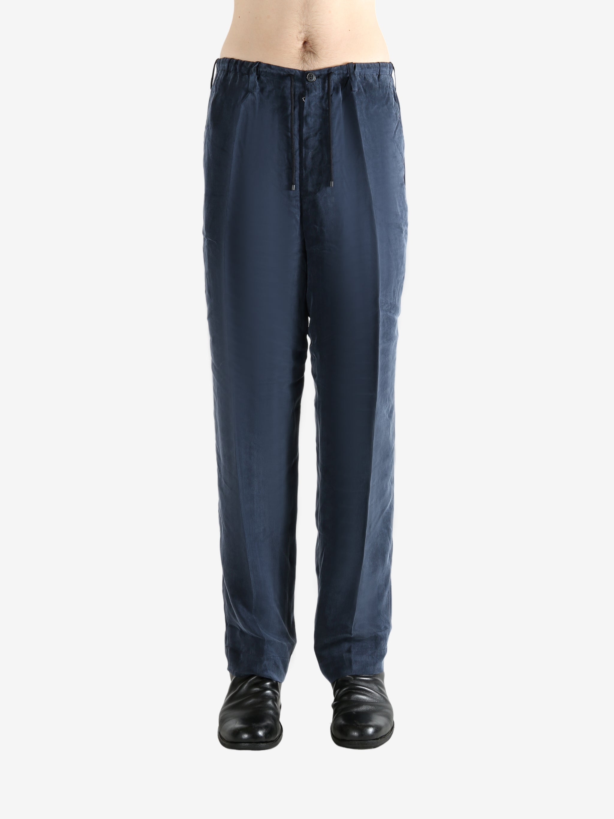 Navy pant worn by a person, showing the pant's fit