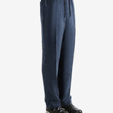 Navy pant worn by a person, showing the pant's fit