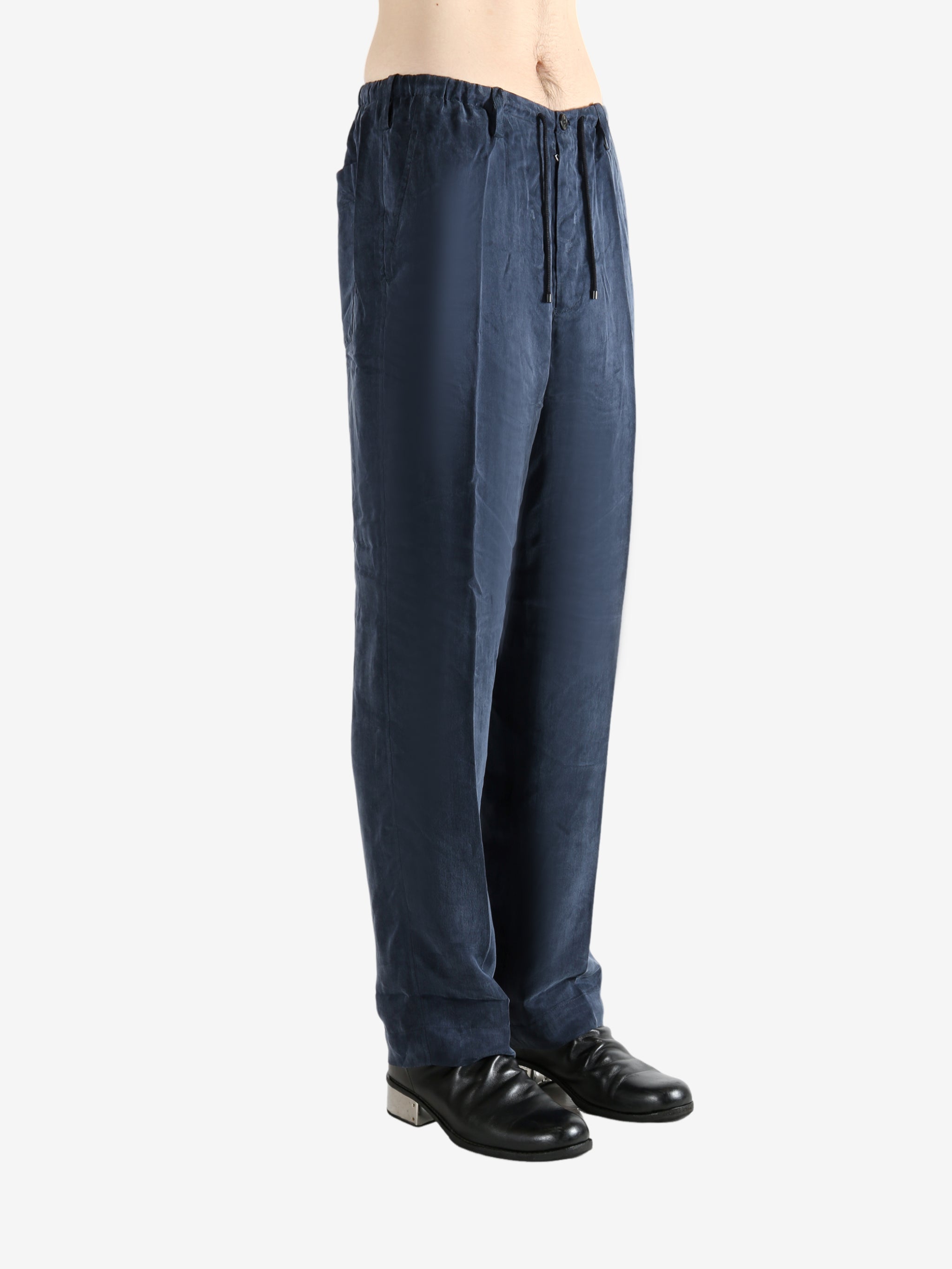 Navy pant worn by a person, showing the pant's fit