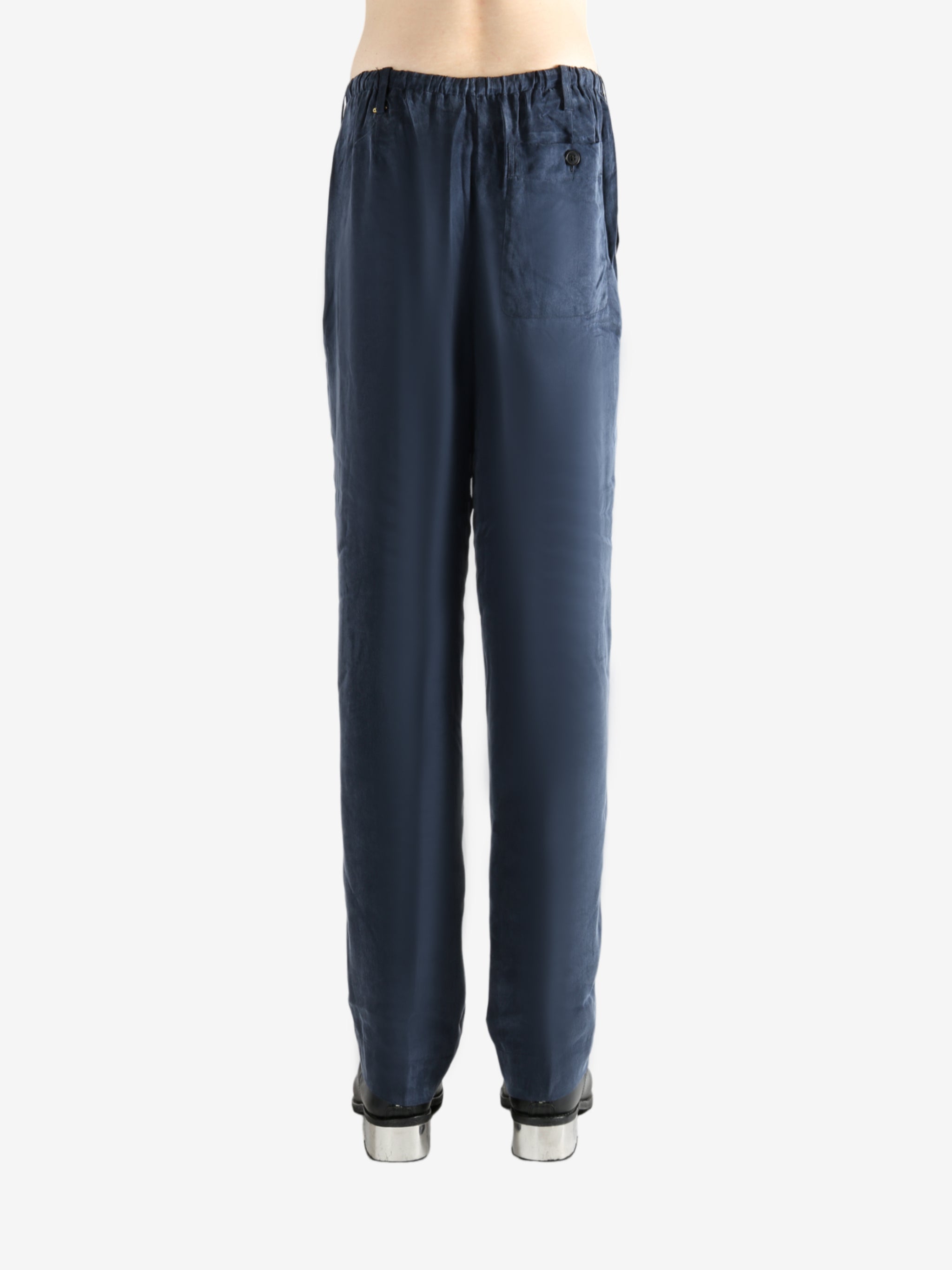 Navy pant worn by a person, showing the pant's fit