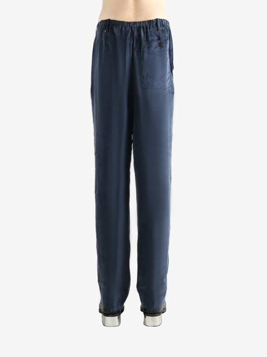 Navy pant worn by a person, showing the pant's fit