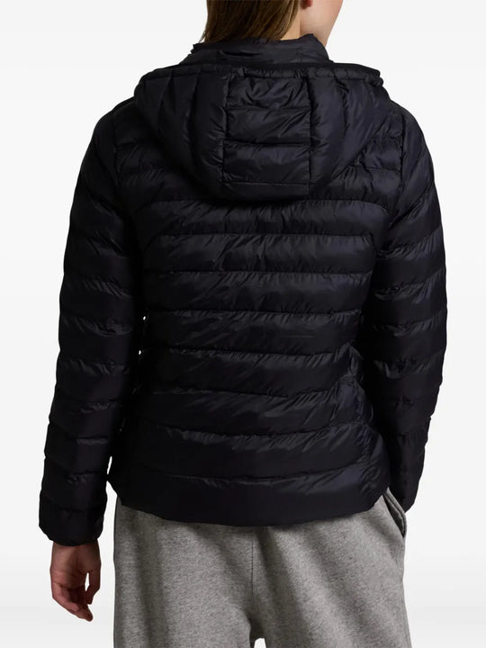 Black jacket worn by a person, showing the jacket's fit