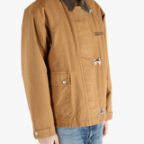 Brown jackets-coats worn by a person, showing the jackets-coats fit