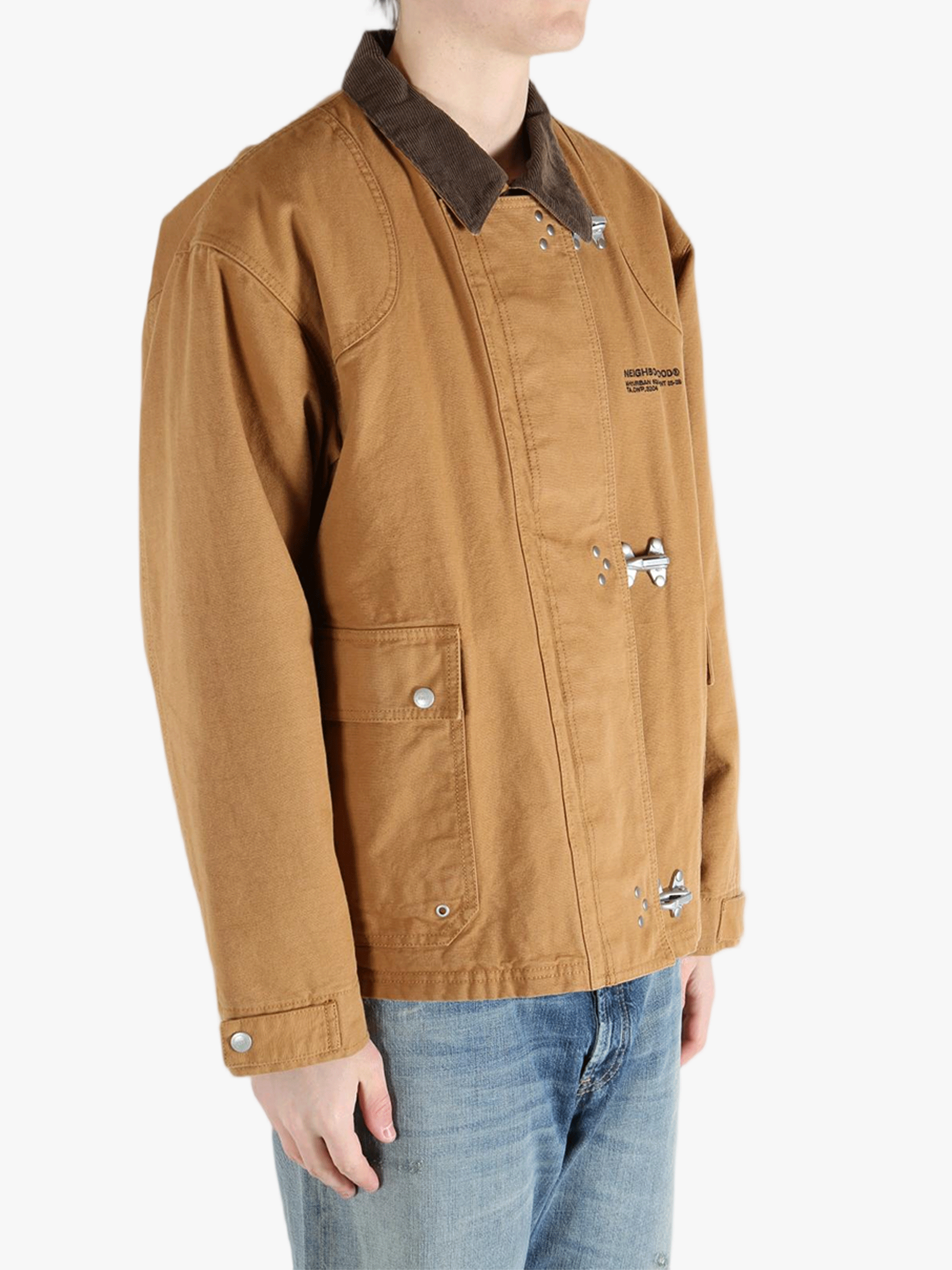 Brown jackets-coats worn by a person, showing the jackets-coats fit