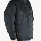 Black jackets-coats worn by a person, showing the jackets-coats fit